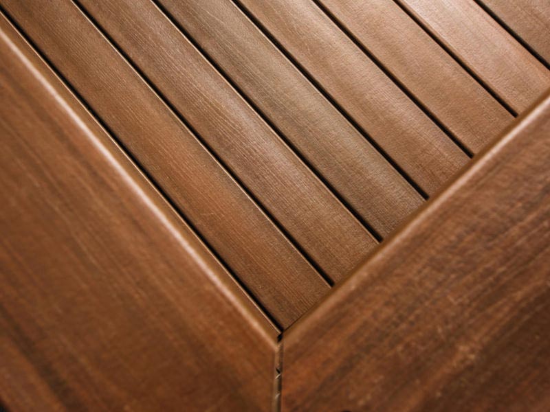 Close view of the corner of a MoistureShield composite deck.