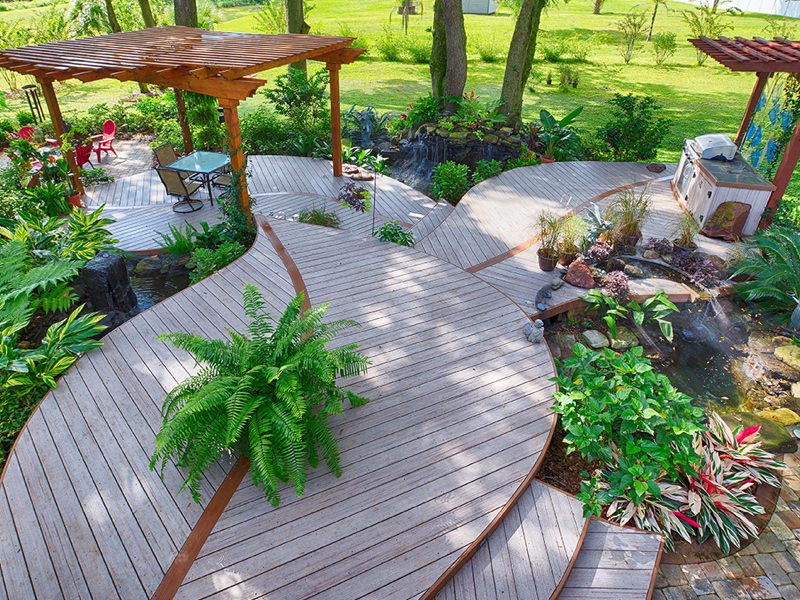 Deck with plants, furniture, and outdoor grill