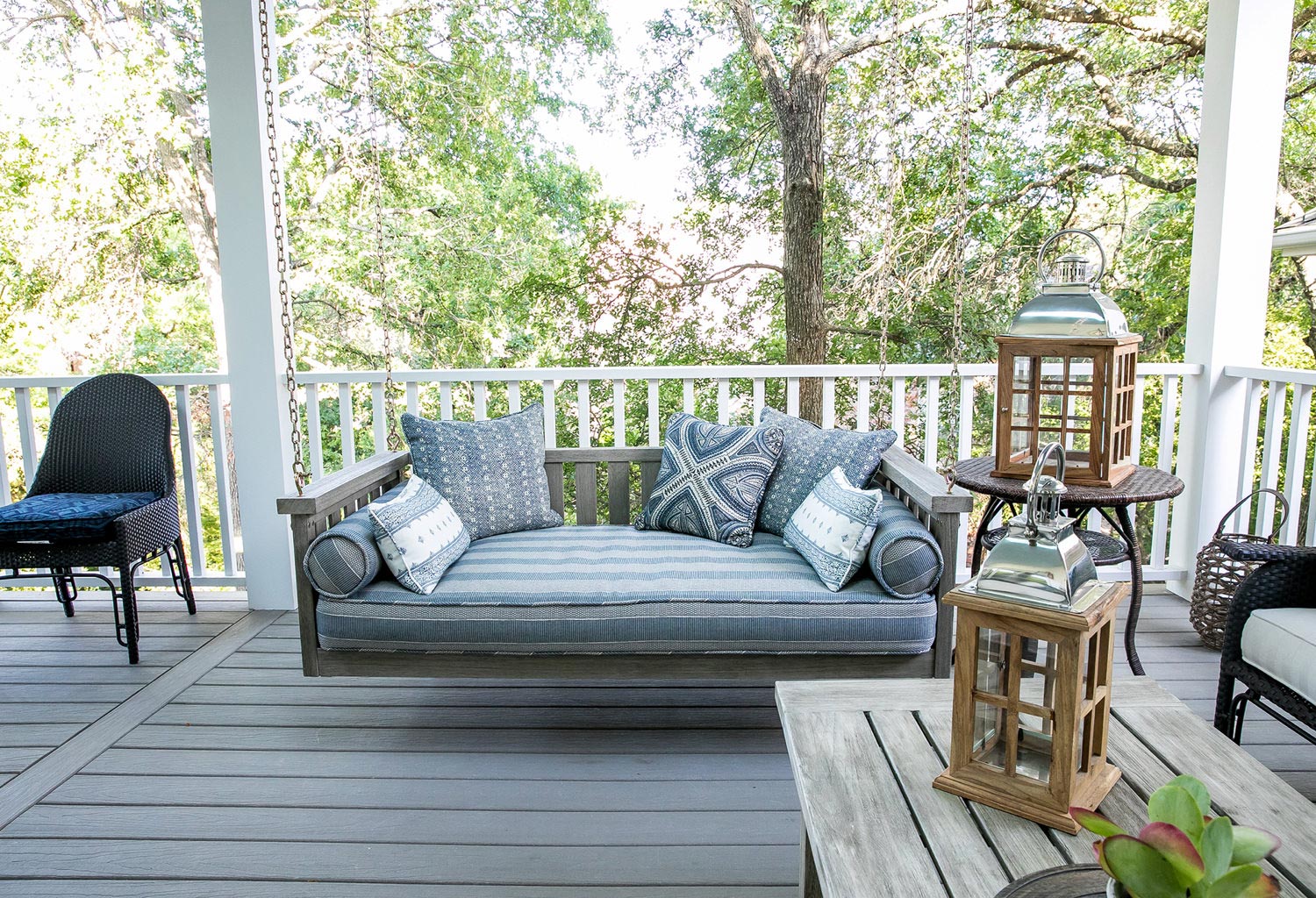 Outdoor deck with bench swing and furniture