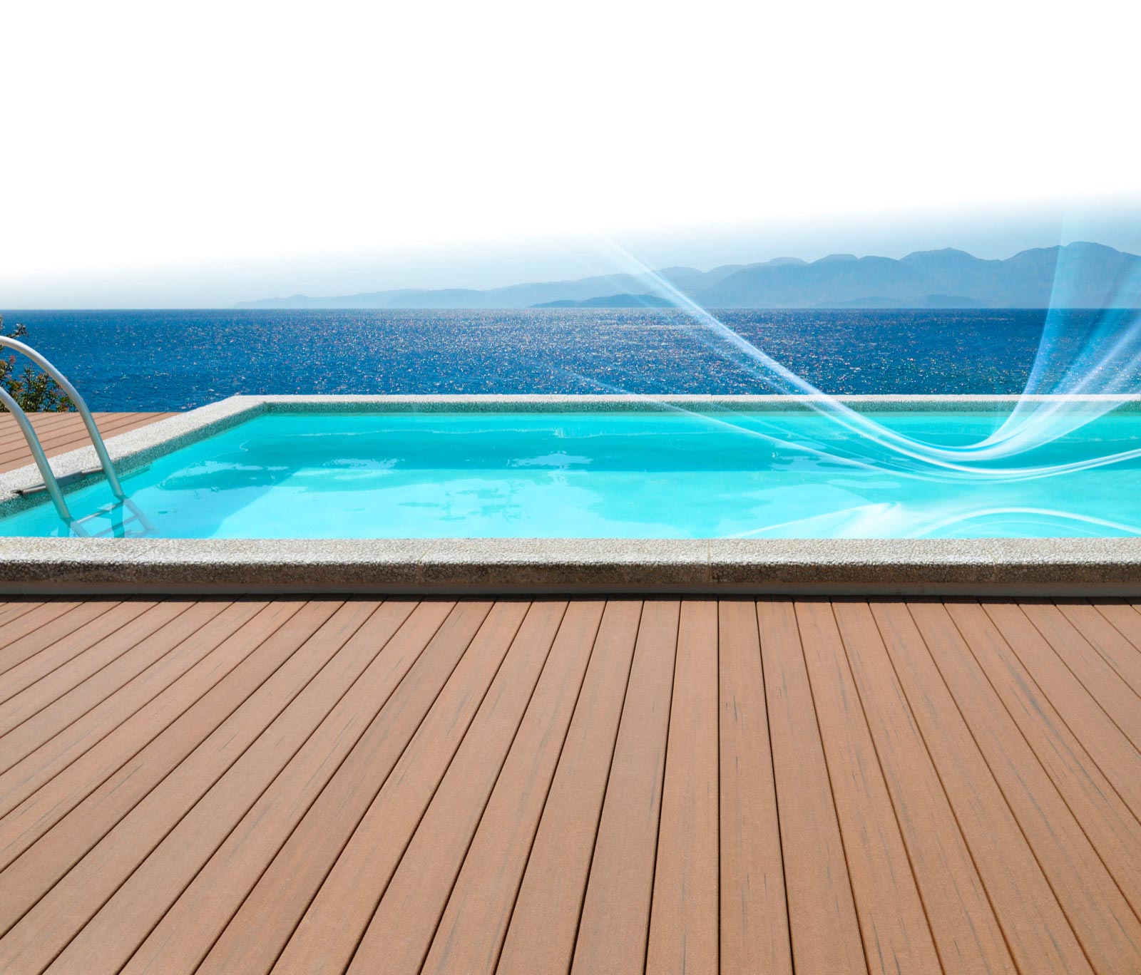 Pool with decking overlooking ocean