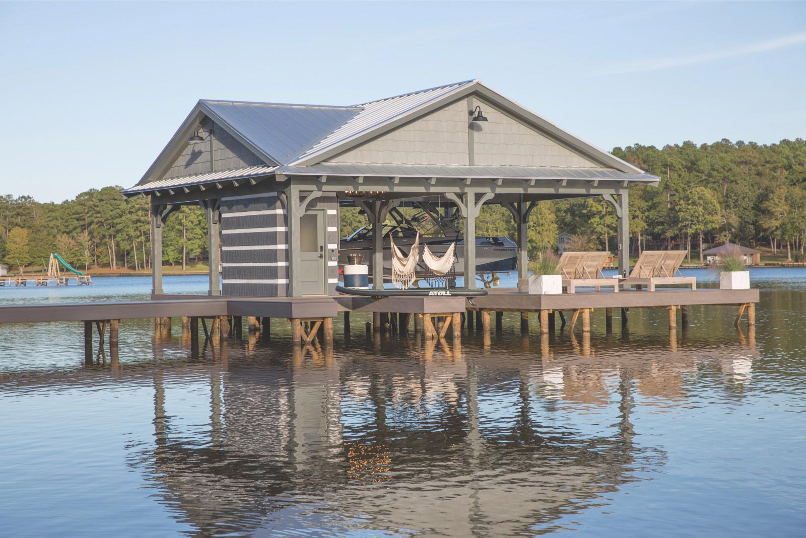 Large dock with chairs and hammocks