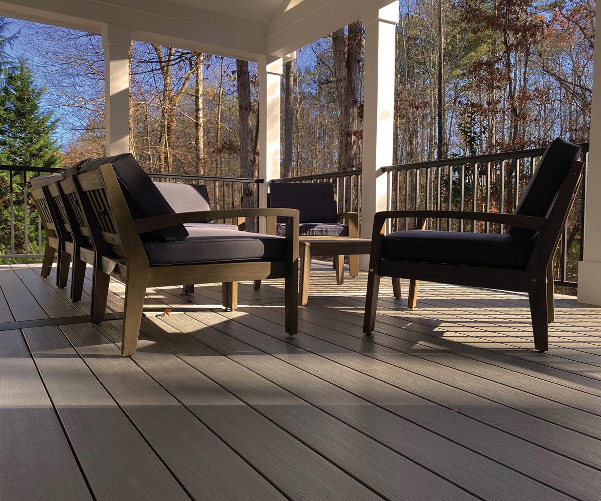 Elevate composite deck with a table and chairs.