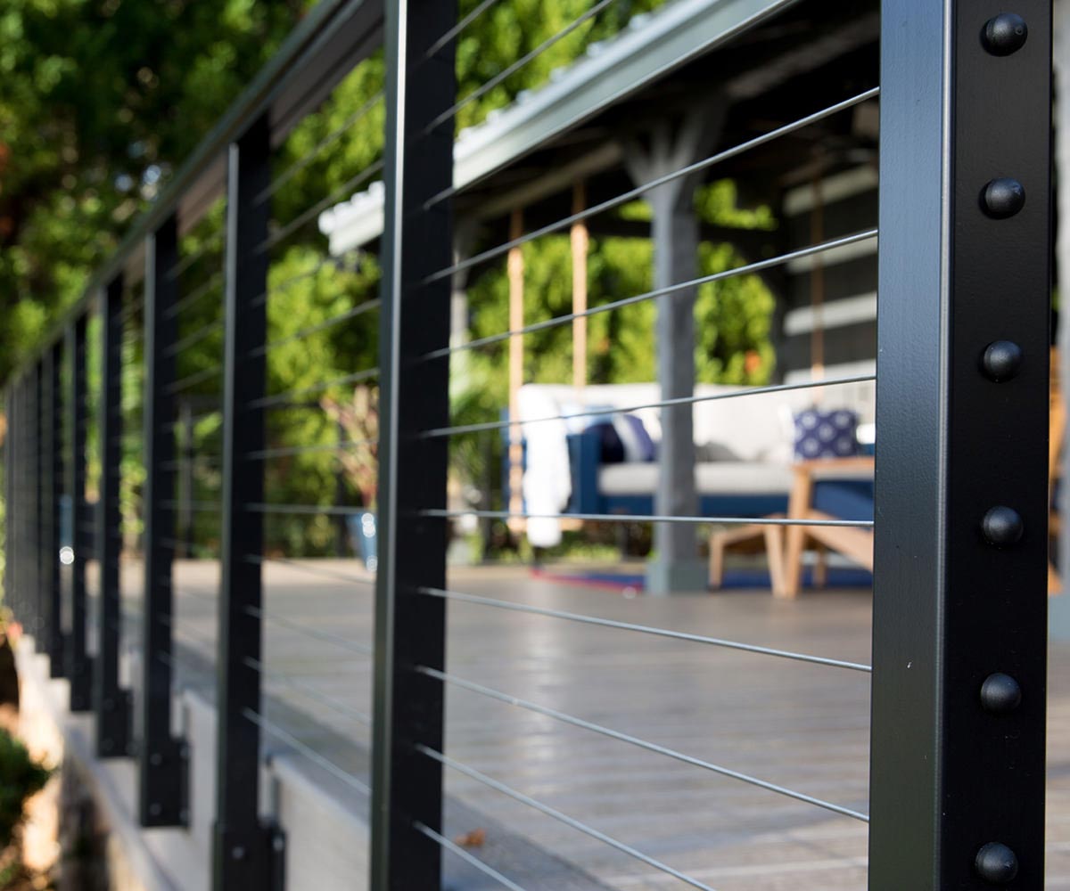 Close view of black aluminum deck railing.