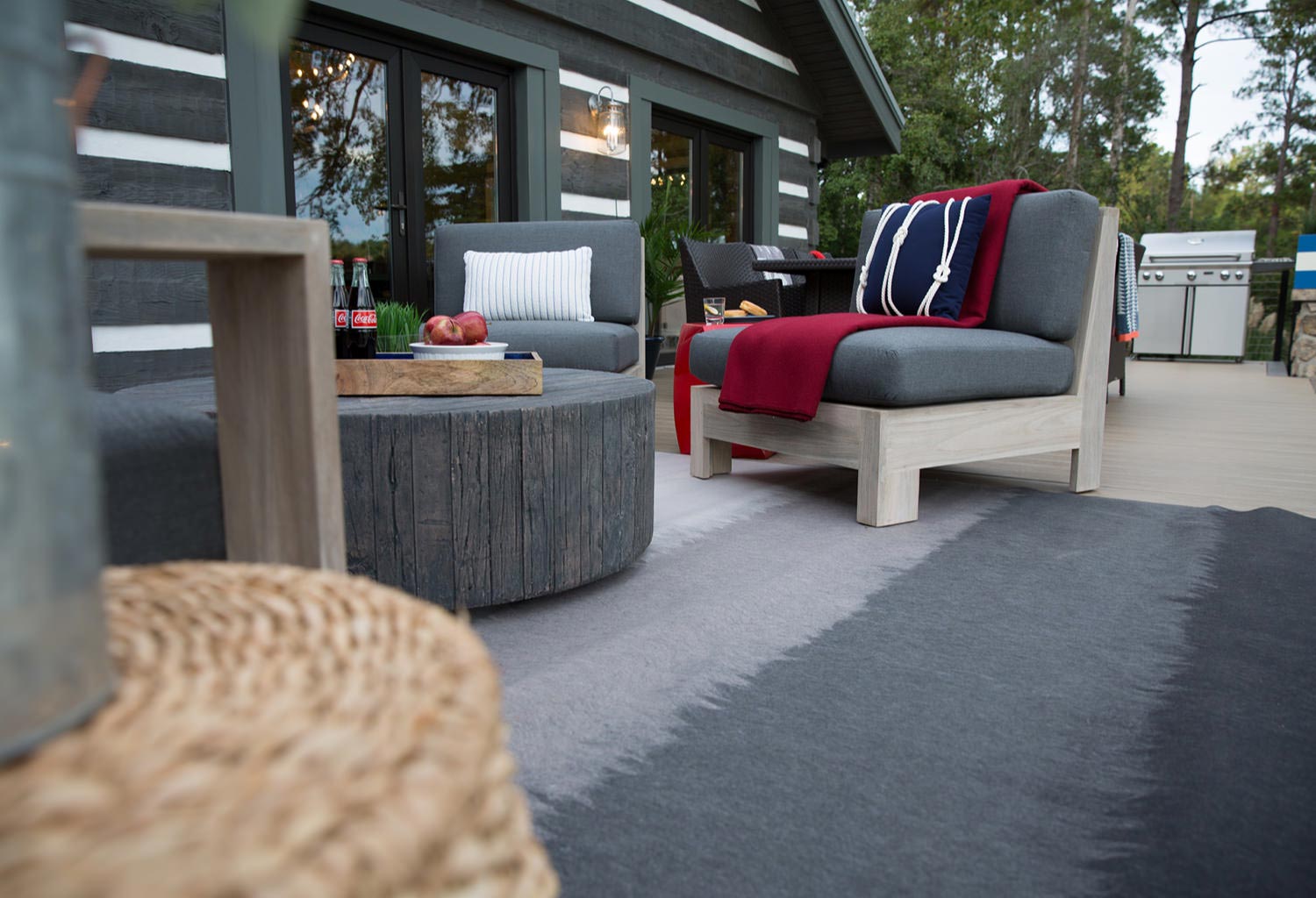 Close view of chairs and a table on a composite deck.