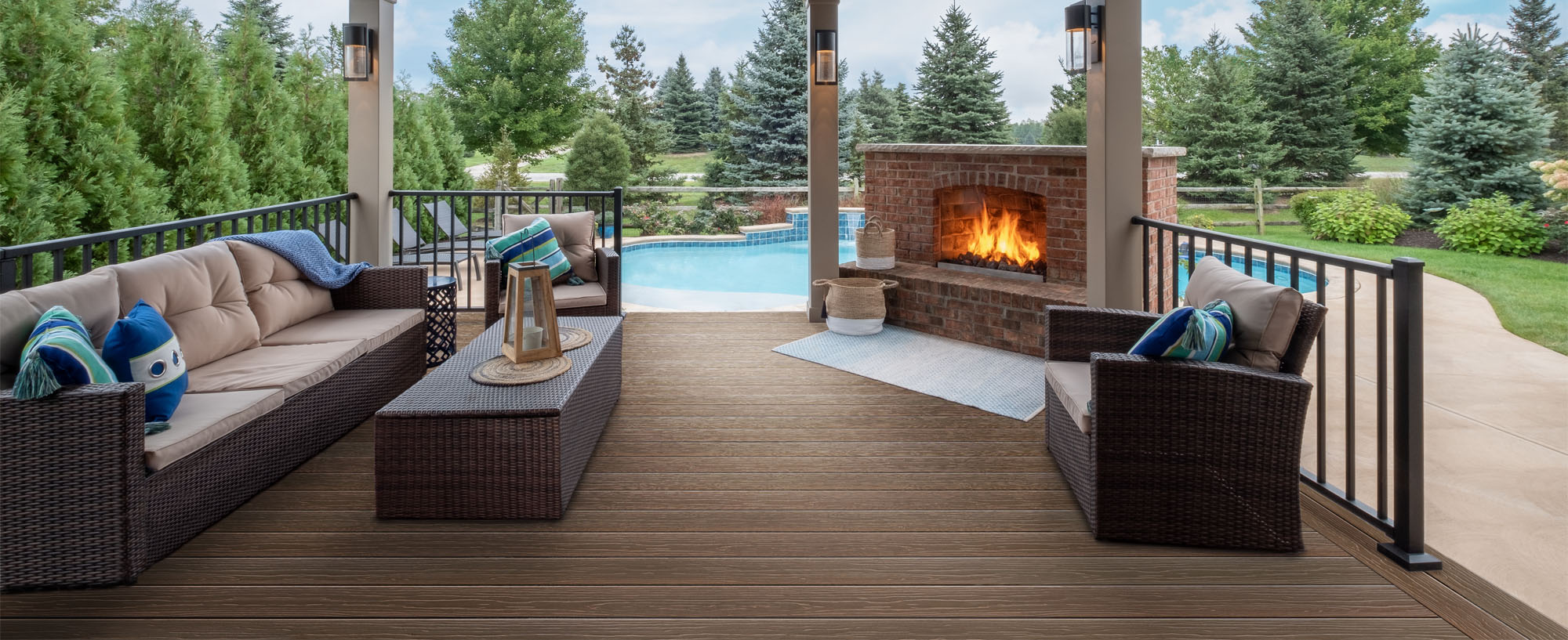 backyard composite decking with fireplace