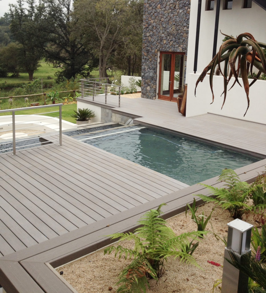 Swimming pool with composite decking